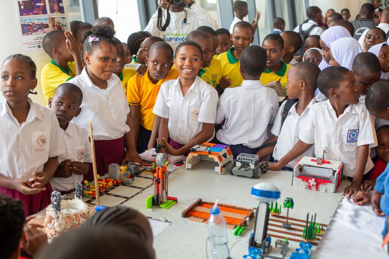 Students exhibiting robotics and mechanical models